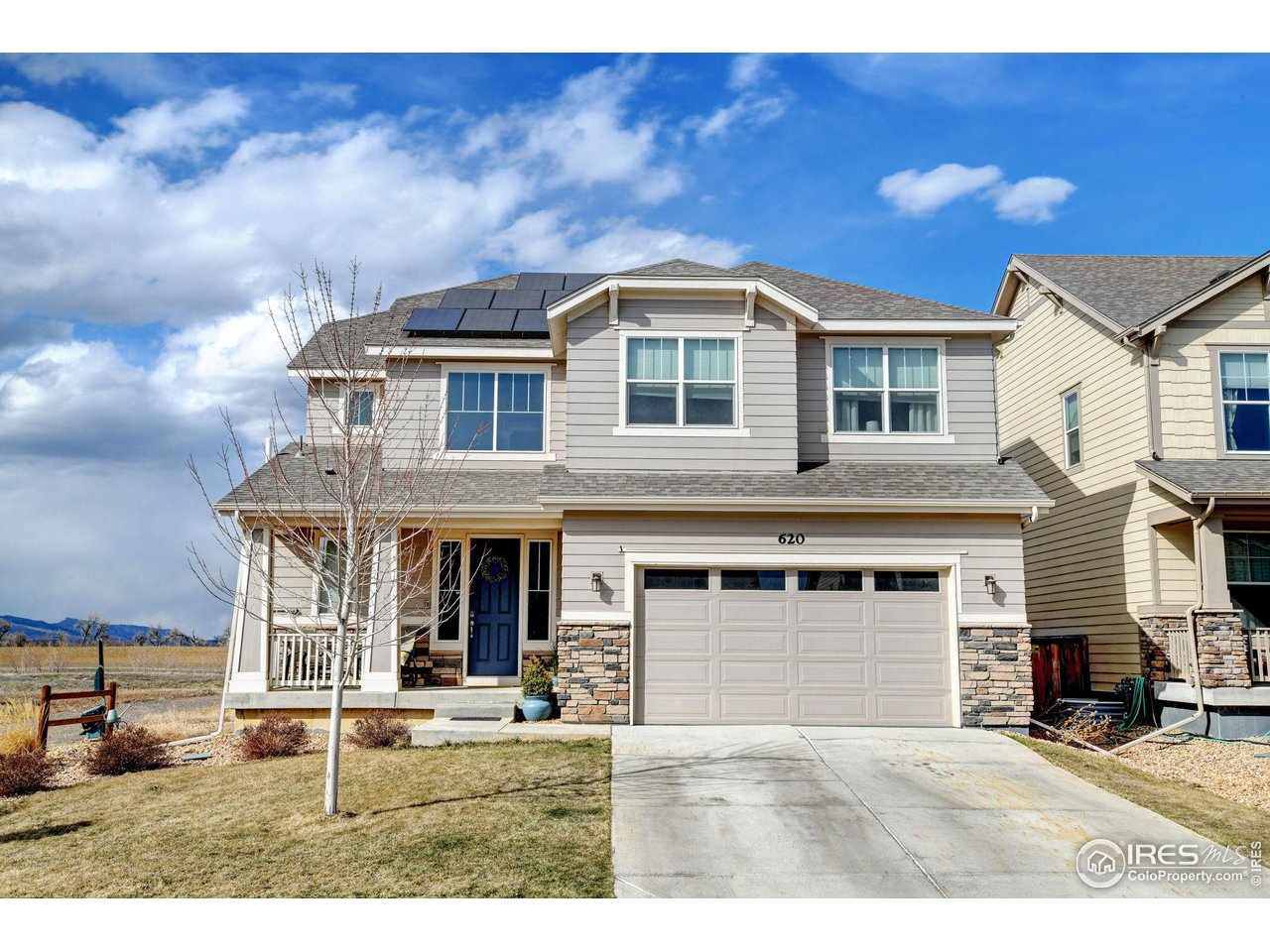 620 Wagon Bend Road Berthoud, CO 80513 - Photo 1 of 39 a backyard of a house with sofas