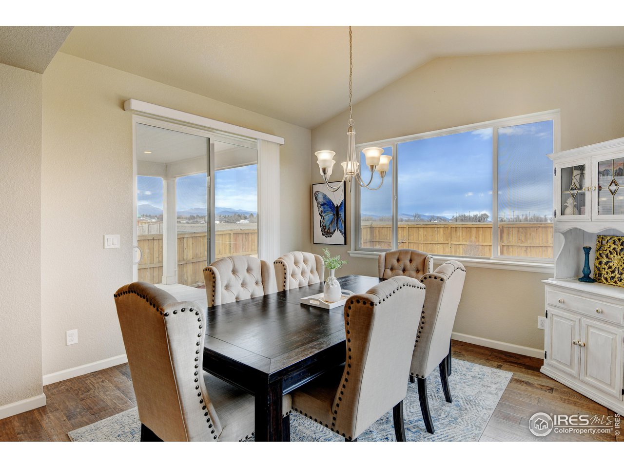 620 Wagon Bend Road Berthoud, CO 80513 - Photo 15 of 39 a view of a dining room with furniture window and outside view