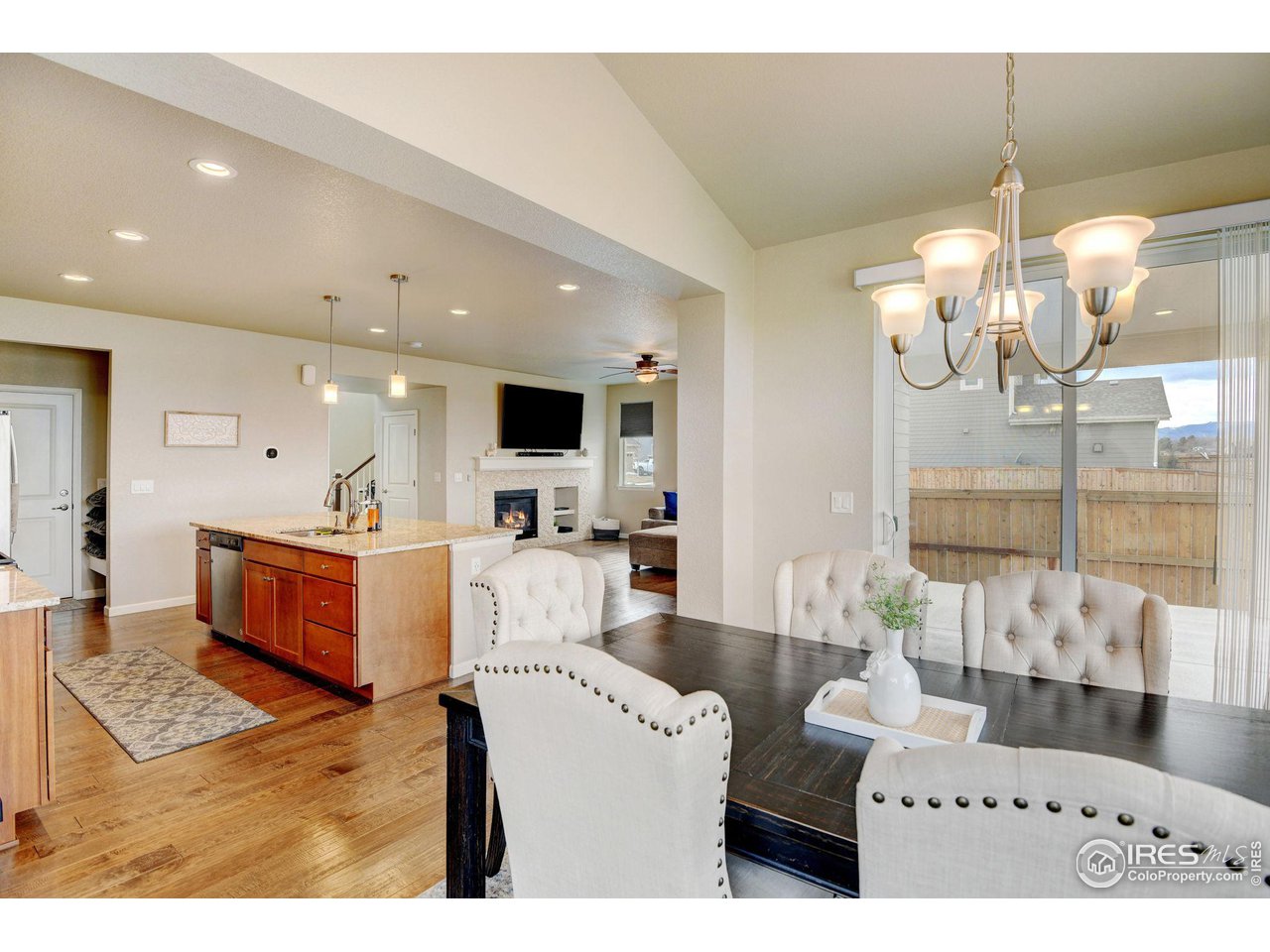 620 Wagon Bend Road Berthoud, CO 80513 - Photo 16 of 39 a living room with furniture and chandelier