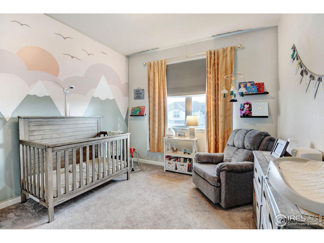 620 Wagon Bend Road Berthoud, CO 80513 - Photo 26 of 39 a bedroom with furniture and a window
