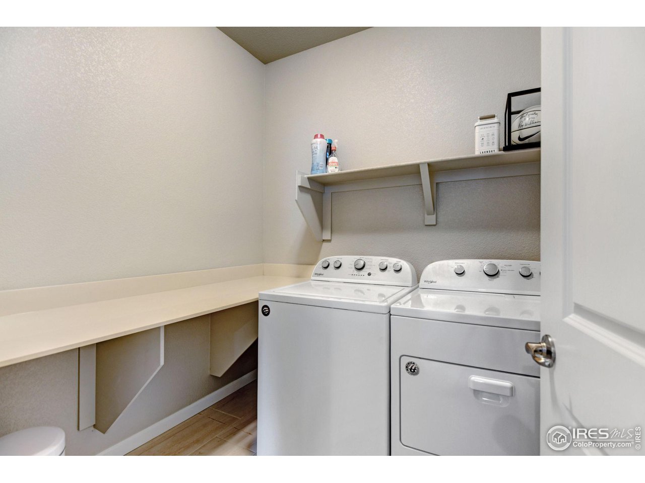 620 Wagon Bend Road Berthoud, CO 80513 - Photo 29 of 39 a utility room with dryer and washer