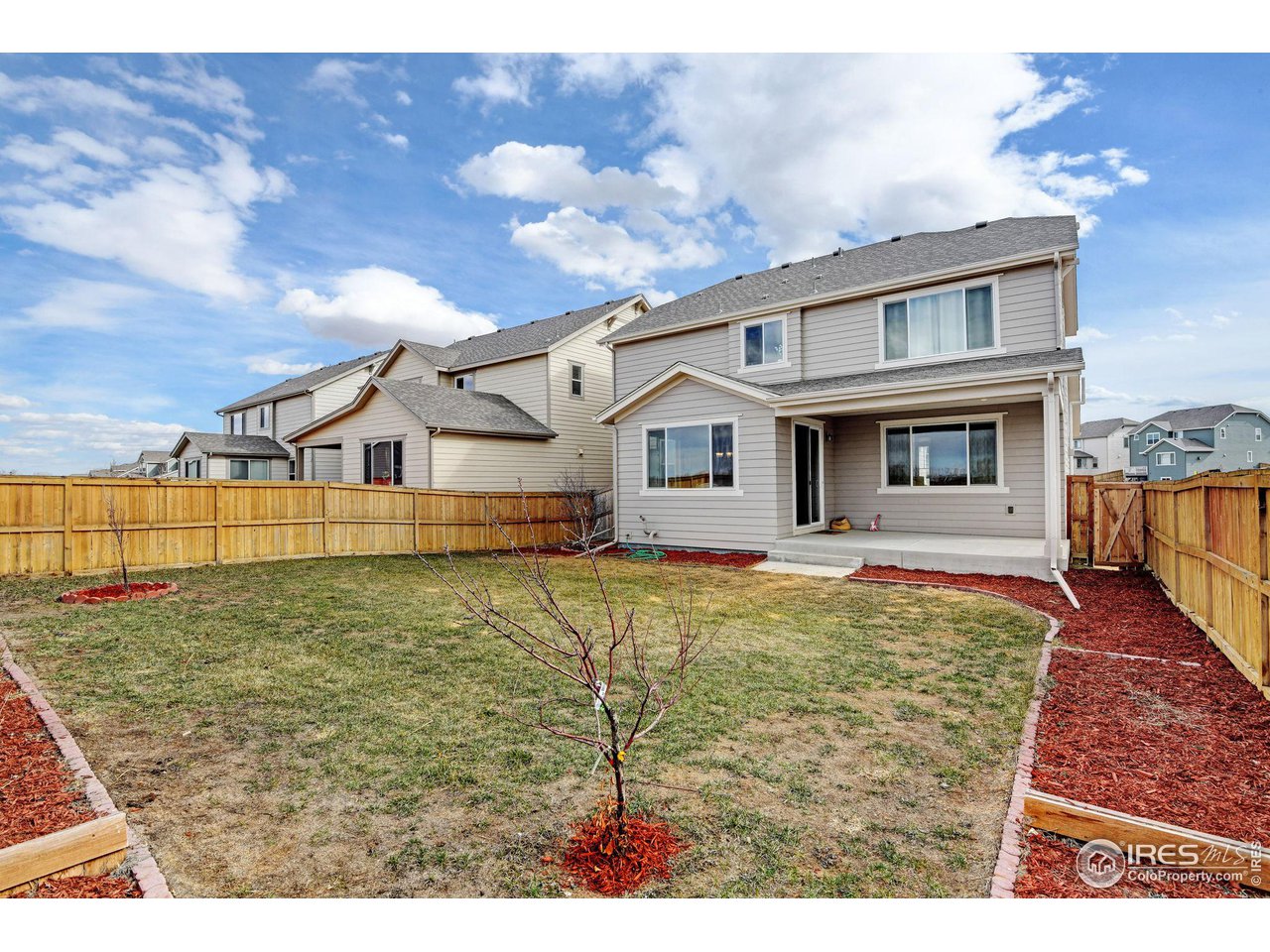 620 Wagon Bend Road Berthoud, CO 80513 - Photo 31 of 39 a house view with swimming pool and wooden fence