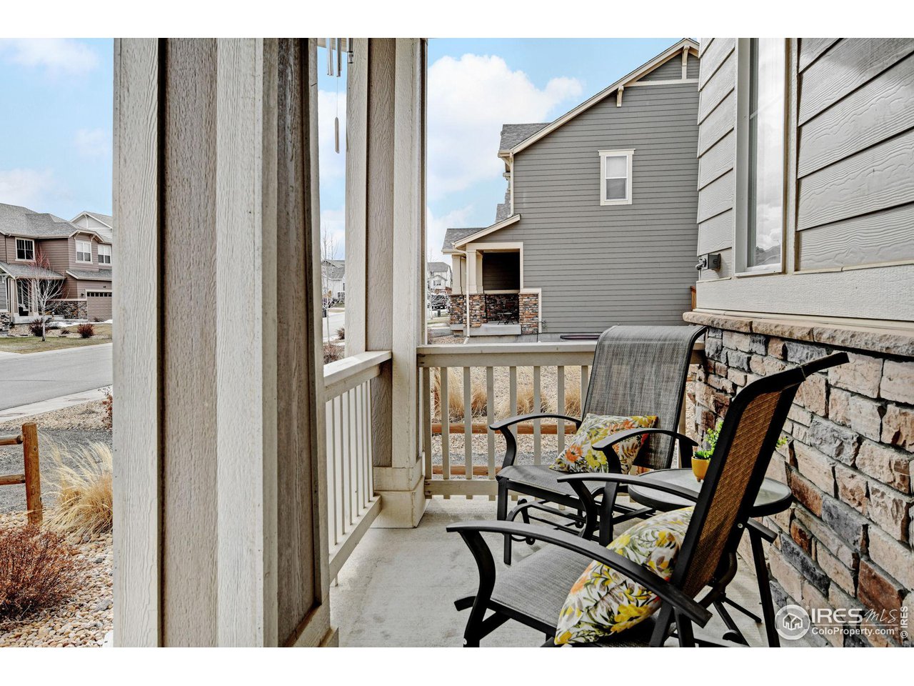 620 Wagon Bend Road Berthoud, CO 80513 - Photo 4 of 39 a view of a dinning room with furniture and floor to ceiling window