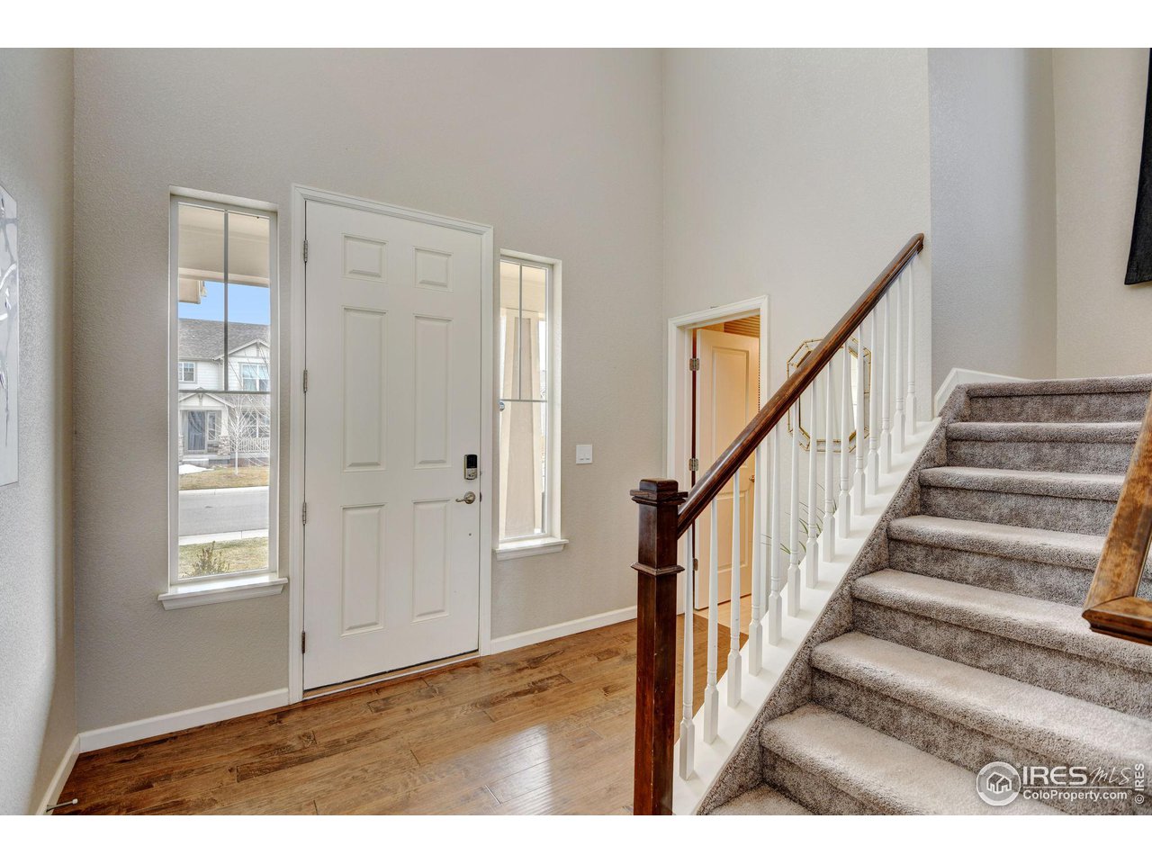 620 Wagon Bend Road Berthoud, CO 80513 - Photo 6 of 39 a view of an entryway with wooden floor