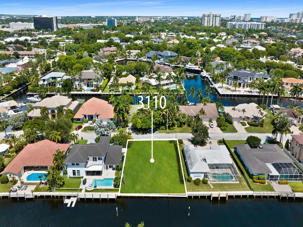 3110 Northeast 59th Street Fort Lauderdale, FL 33308 - Photo 12 of 15 an aerial view of a house with a swimming pool yard and outdoor seating
