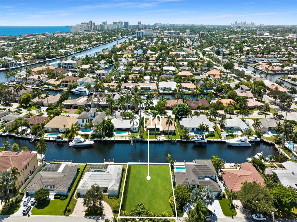 3110 Northeast 59th Street Fort Lauderdale, FL 33308 - Photo 14 of 15 an aerial view of a city with a lake view