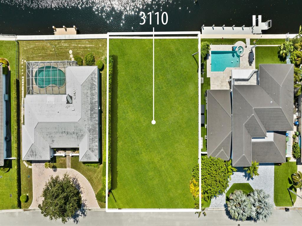 3110 Northeast 59th Street Fort Lauderdale, FL 33308 - Photo 15 of 15 an aerial view of a house with a garden