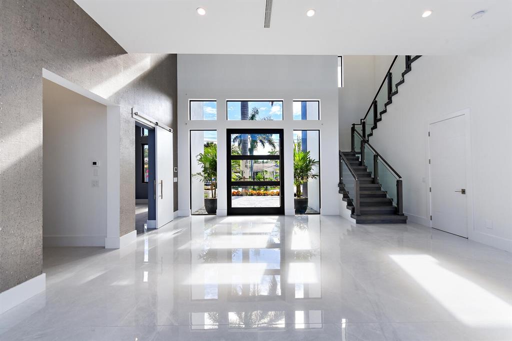 3110 Northeast 59th Street Fort Lauderdale, FL 33308 - Photo 6 of 15 a view of an entryway with a front door