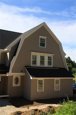 389 Pope Road Concord, MA 01742 - Photo 5 of 17 a front view of a house with a garage