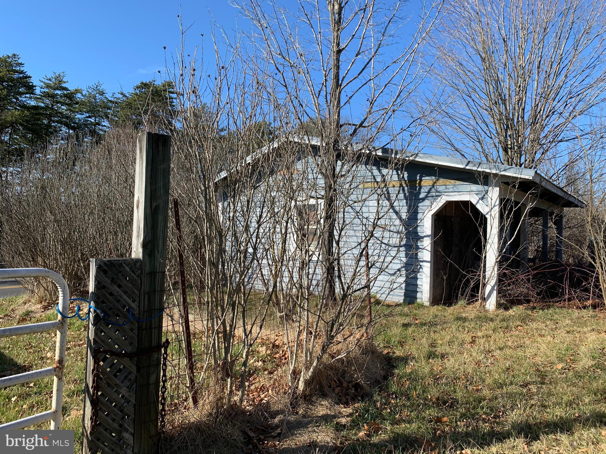 11169 Winchester Grade Road Berkeley Springs, WV 25411 - Photo 19 of 28 Storage building and garage