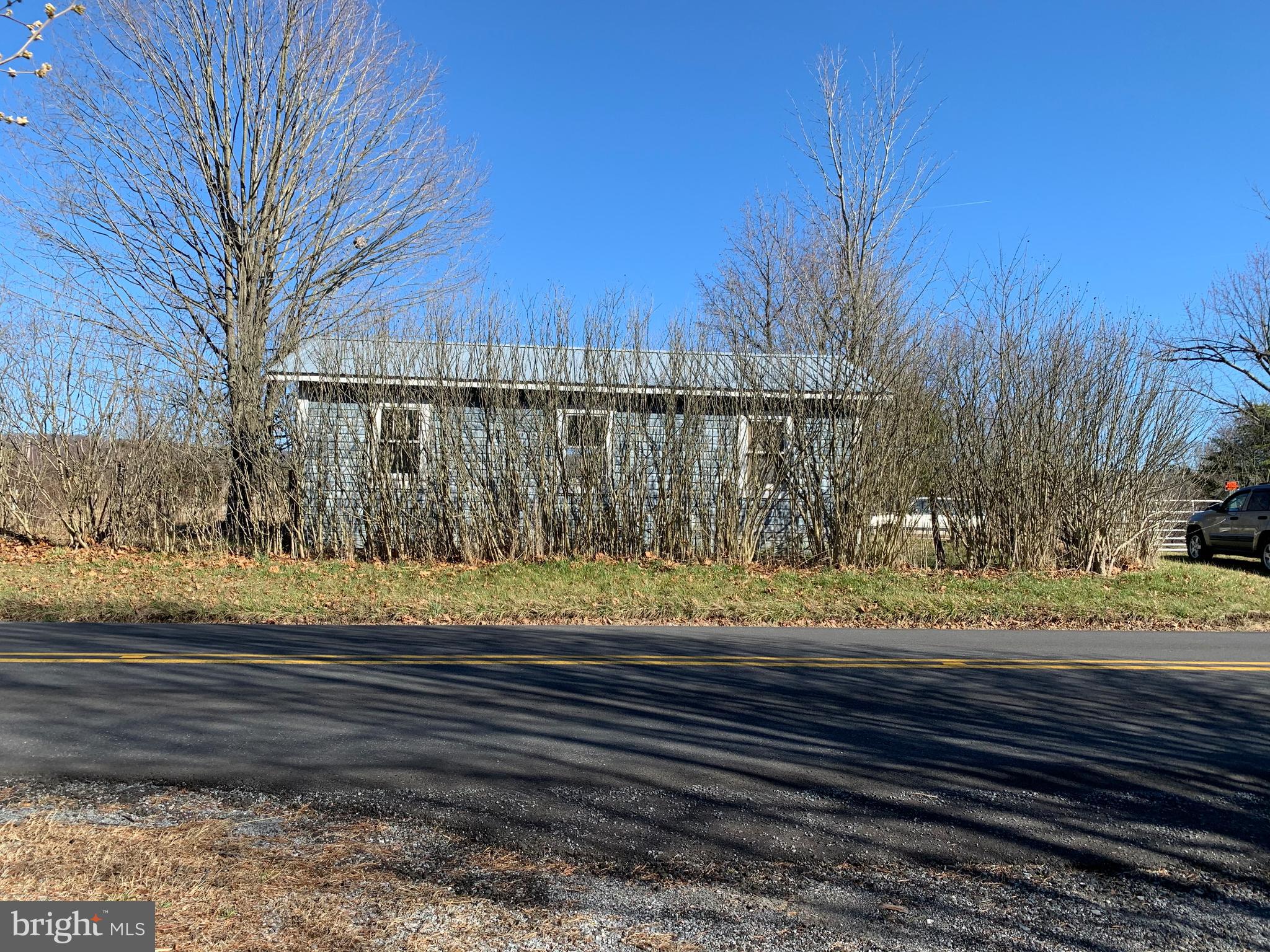 11169 Winchester Grade Road Berkeley Springs, WV 25411 - Photo 20 of 28 Storage building and garage