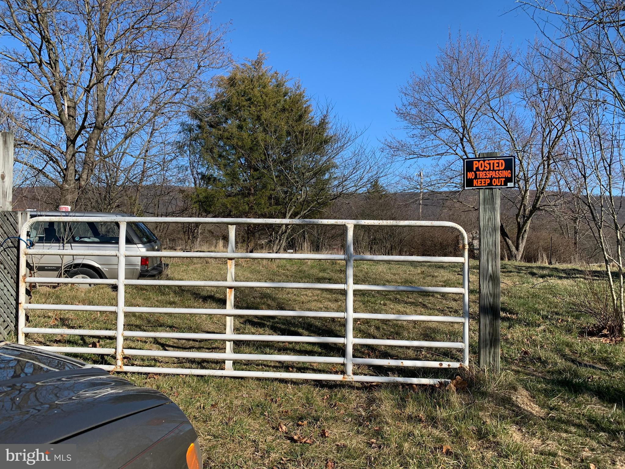 11169 Winchester Grade Road Berkeley Springs, WV 25411 - Photo 3 of 28 Driveway has a gate