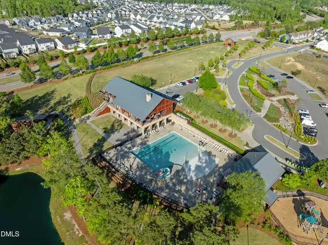 an aerial view of a house with a ocean view