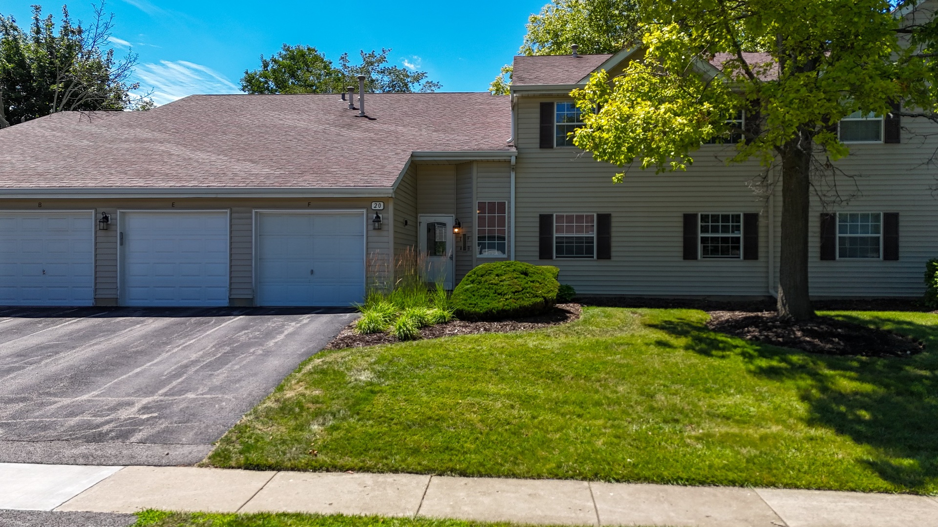 20 Gant Circle, Unit E Streamwood, IL 60107 - Photo 1 of 20 front view of a house with a yard