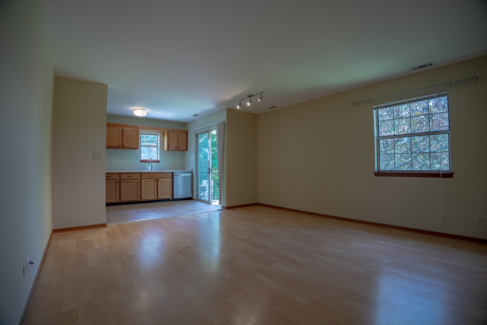 20 Gant Circle, Unit E Streamwood, IL 60107 - Photo 14 of 20 an empty room with wooden floor and windows