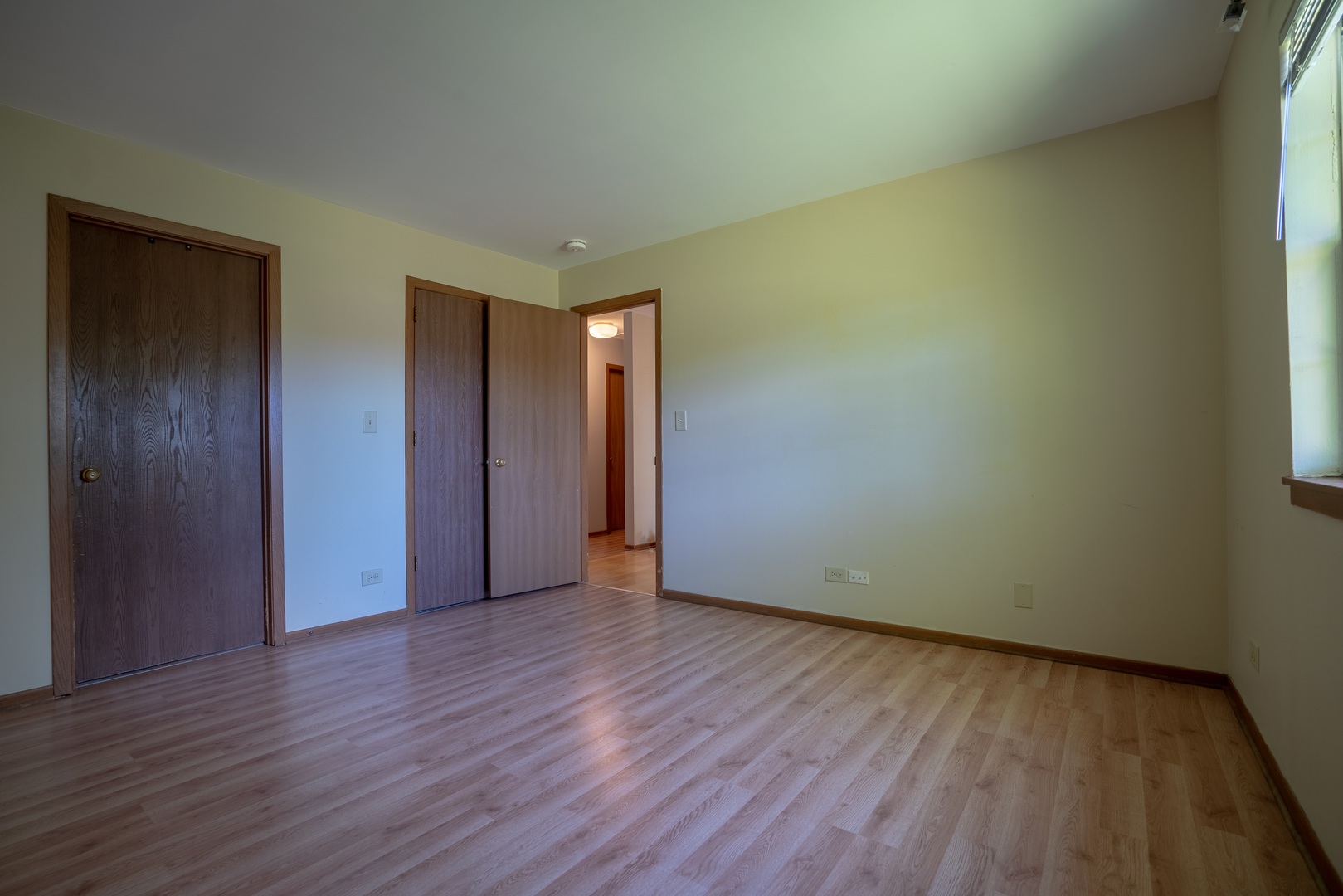 20 Gant Circle, Unit E Streamwood, IL 60107 - Photo 9 of 20 a view of an empty room with wooden floor
