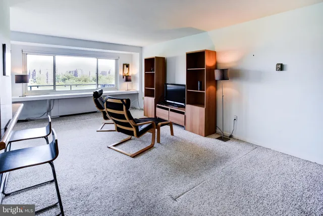 a work room with furniture and a lamp