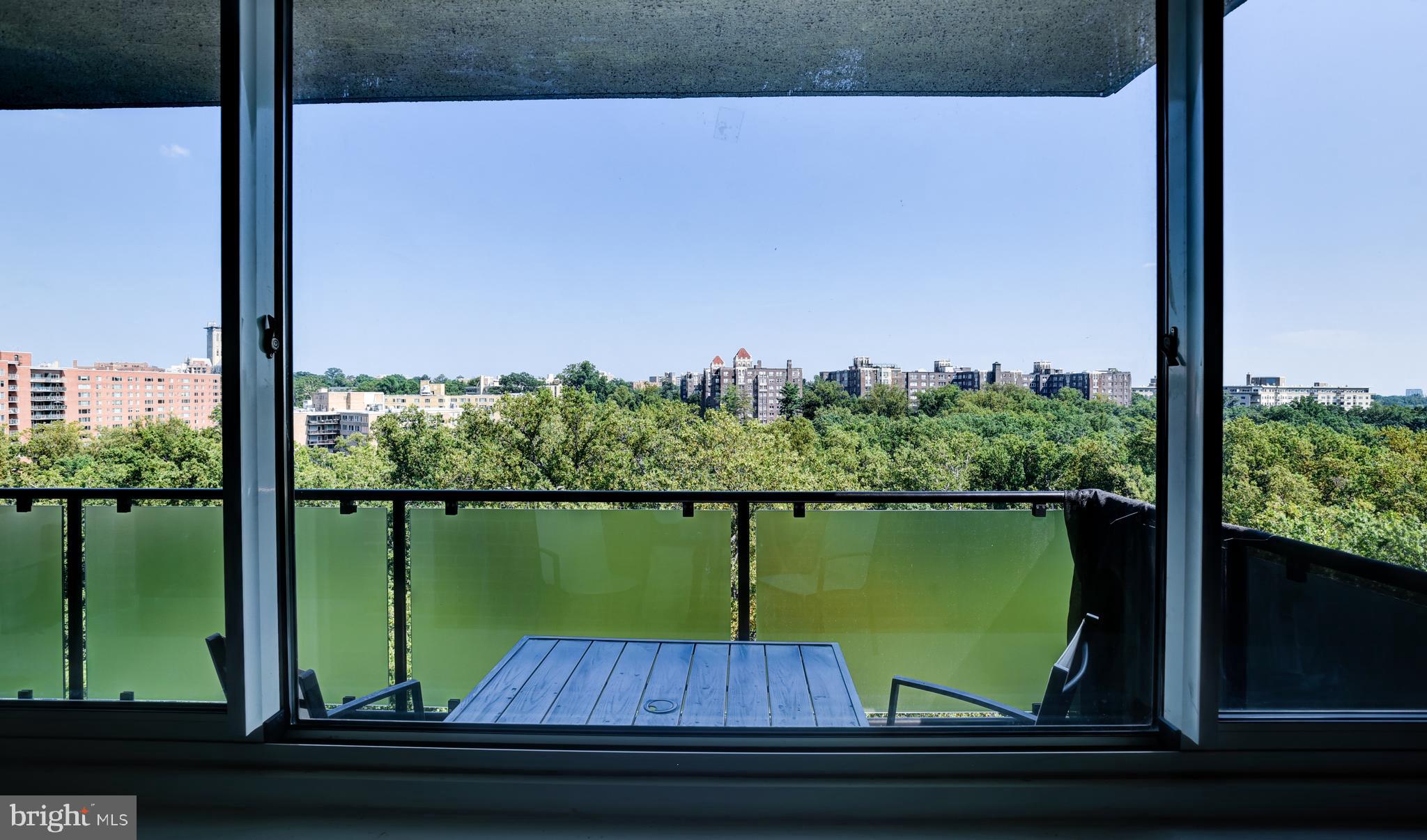 4201 Cathedral Avenue Northwest, Unit 1411E Washington, DC 20016 - Photo 41 of 66 a view of a lake from a window