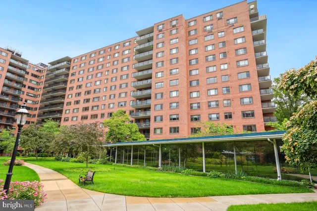 a view of an empty room with glass door