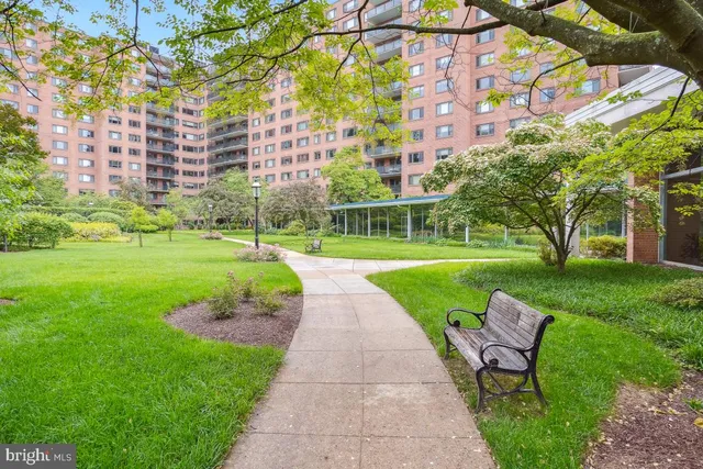 a store area with lots of furniture and a book shelf