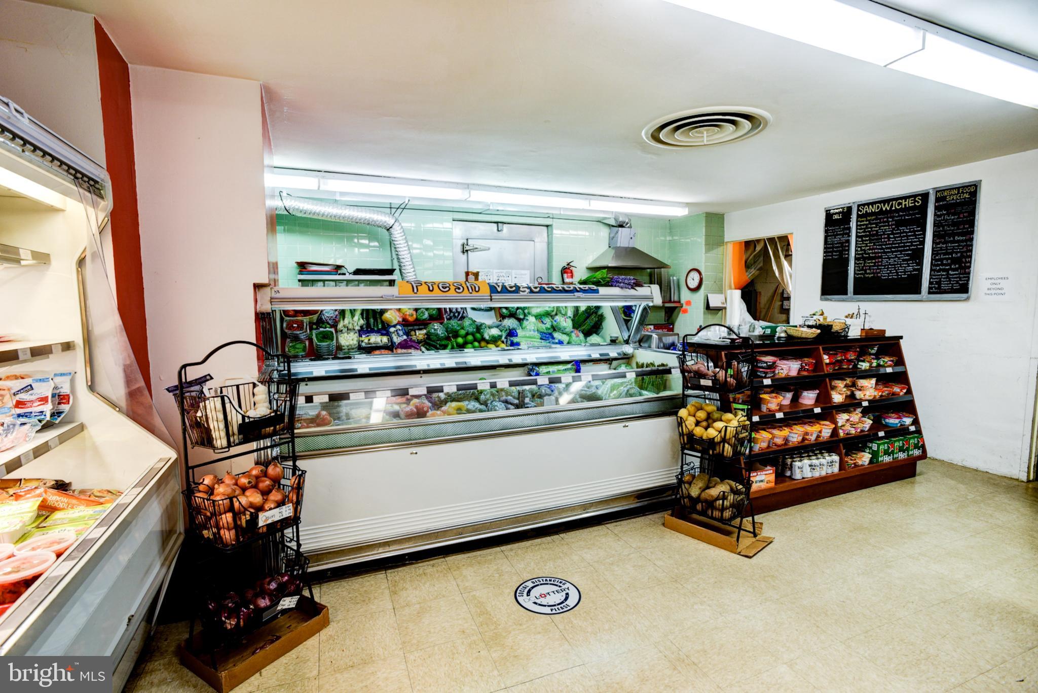 4201 Cathedral Avenue Northwest, Unit 1411E Washington, DC 20016 - Photo 64 of 66 a room with lots of different kinds of food