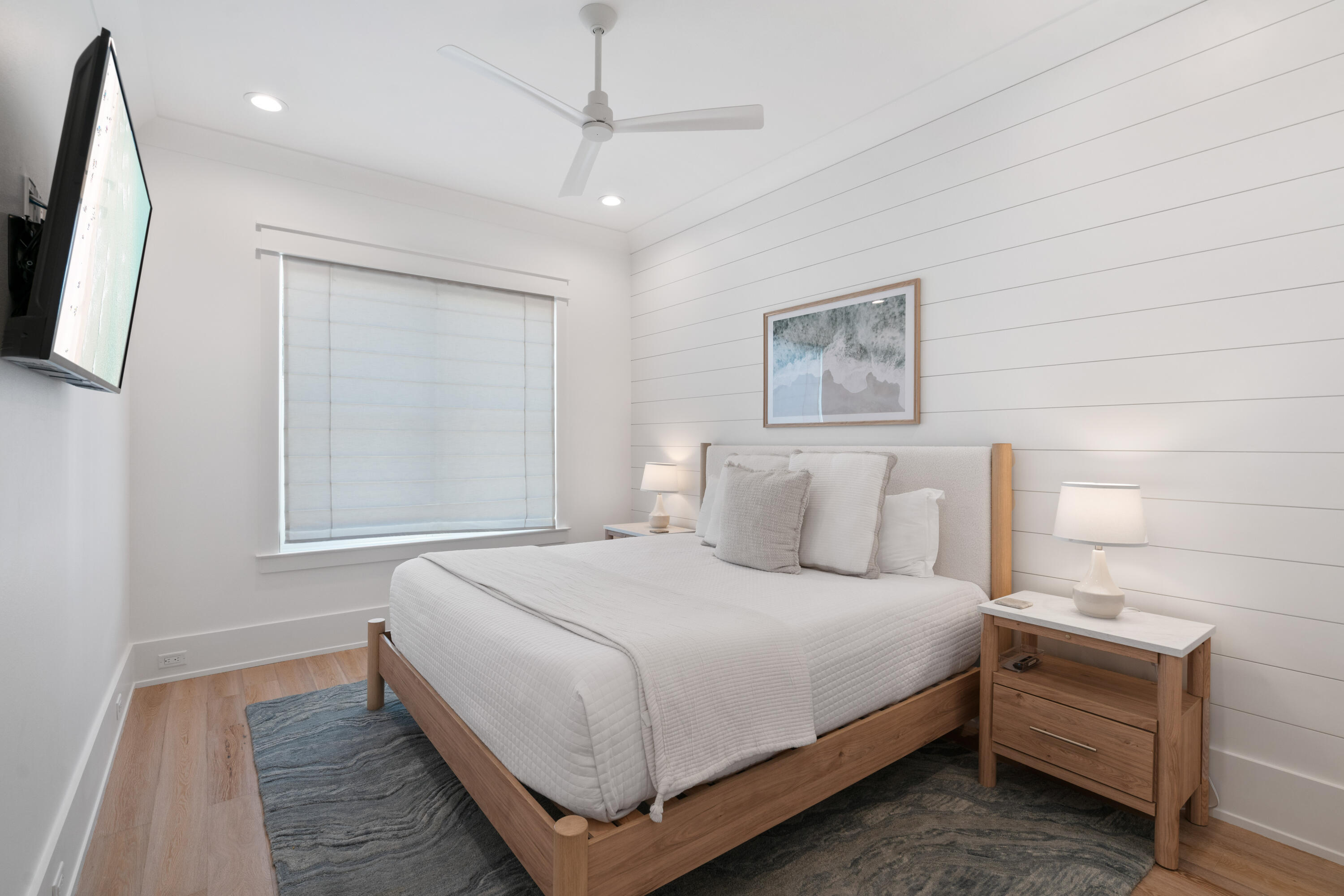 16 Bluewater View Ave Inlet Beach Inlet Beach, FL 32461 - Photo 20 of 59 a bedroom with a bed and a flat screen tv