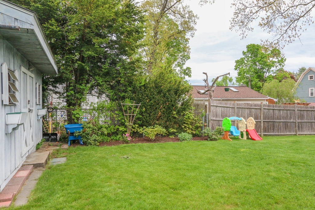39 Old Brook Road Springfield, MA 01118 - Photo 19 of 20 a view of a chair with a yard