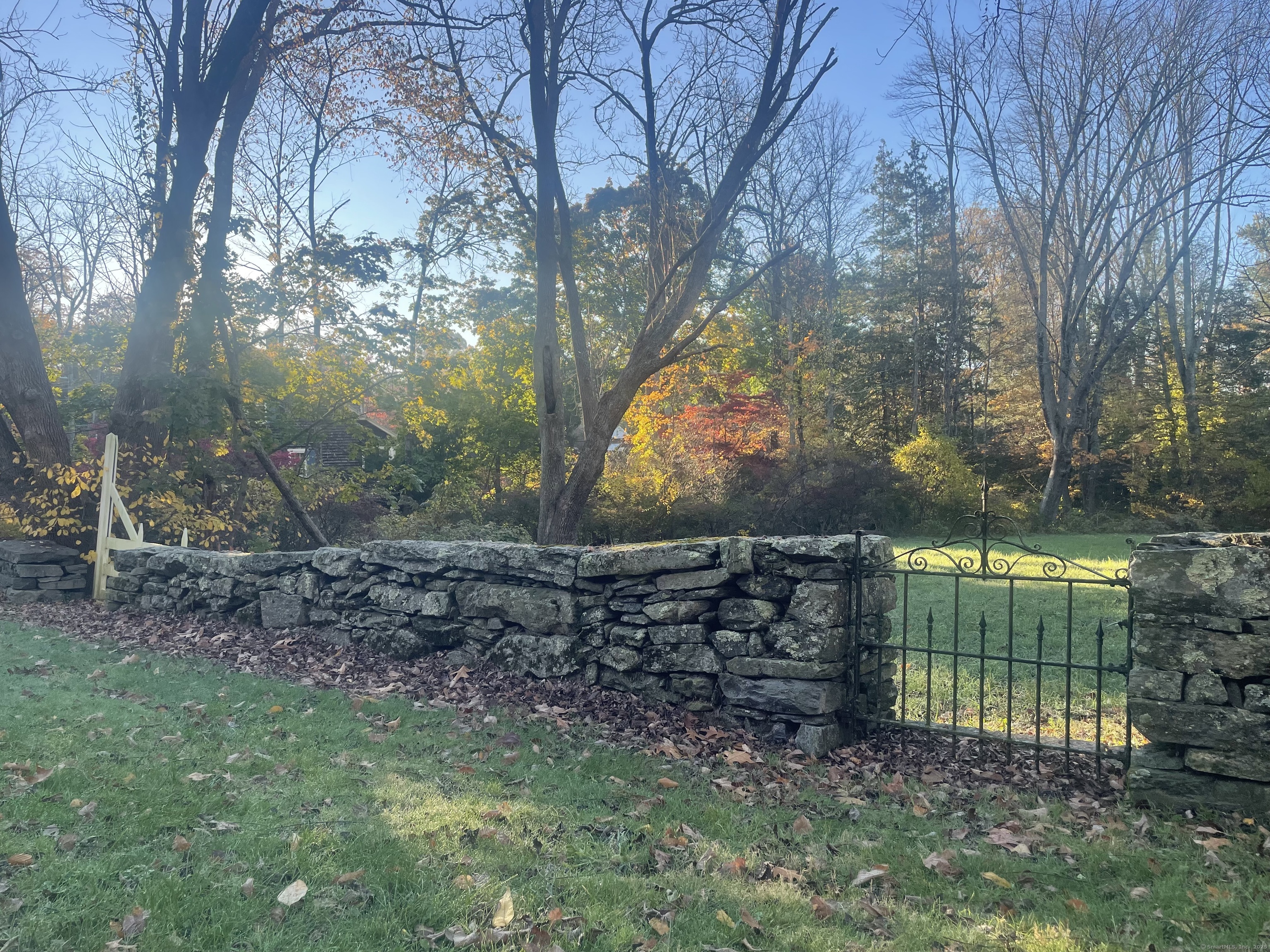 36 Scotland Road Norwich, CT 06360 - Photo 5 of 7 a view of a yard with a fountain