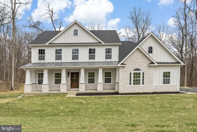a view of a dining room with furniture and window