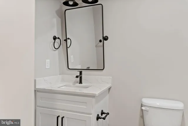 a view of a room with wooden walls