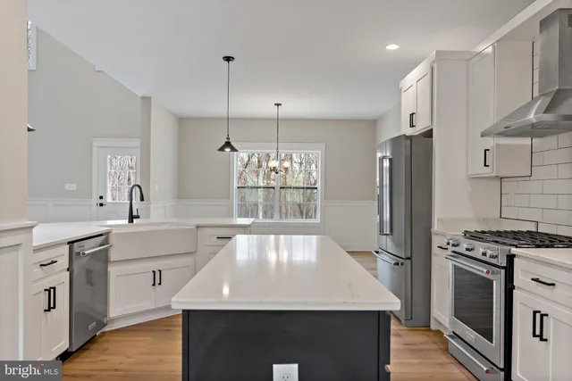 a bathroom with a bathtub and a sink