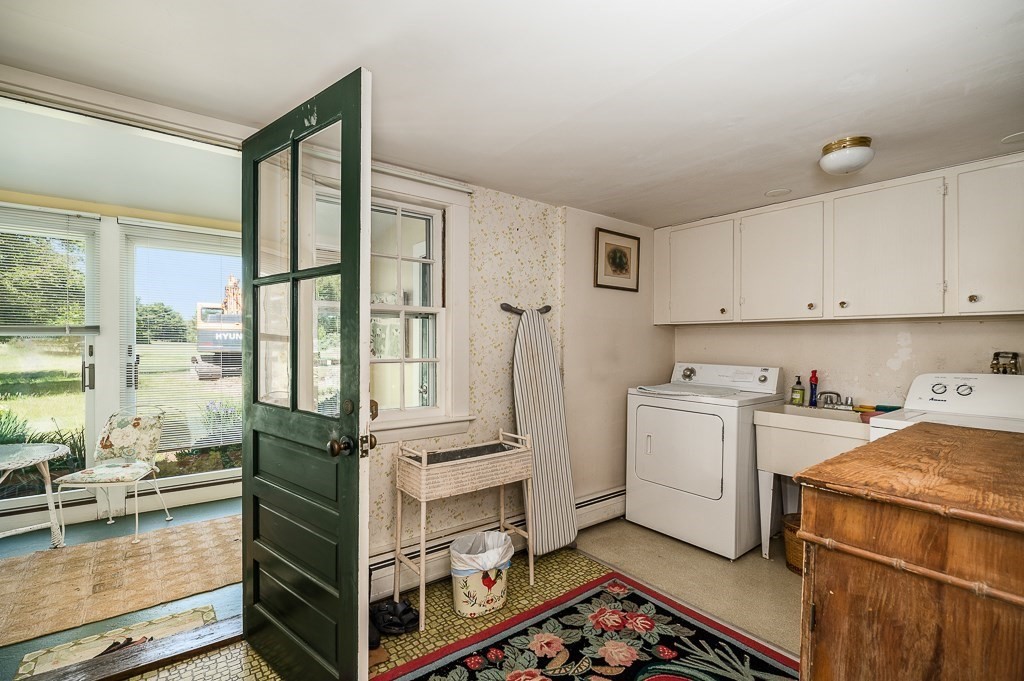 466 Bridge Street Hamilton, MA 01982 - Photo 11 of 40 a view of kitchen with faucet cabinets and outdoor view