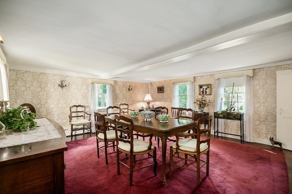 466 Bridge Street Hamilton, MA 01982 - Photo 12 of 40 a view of a dining room with furniture and wooden floor