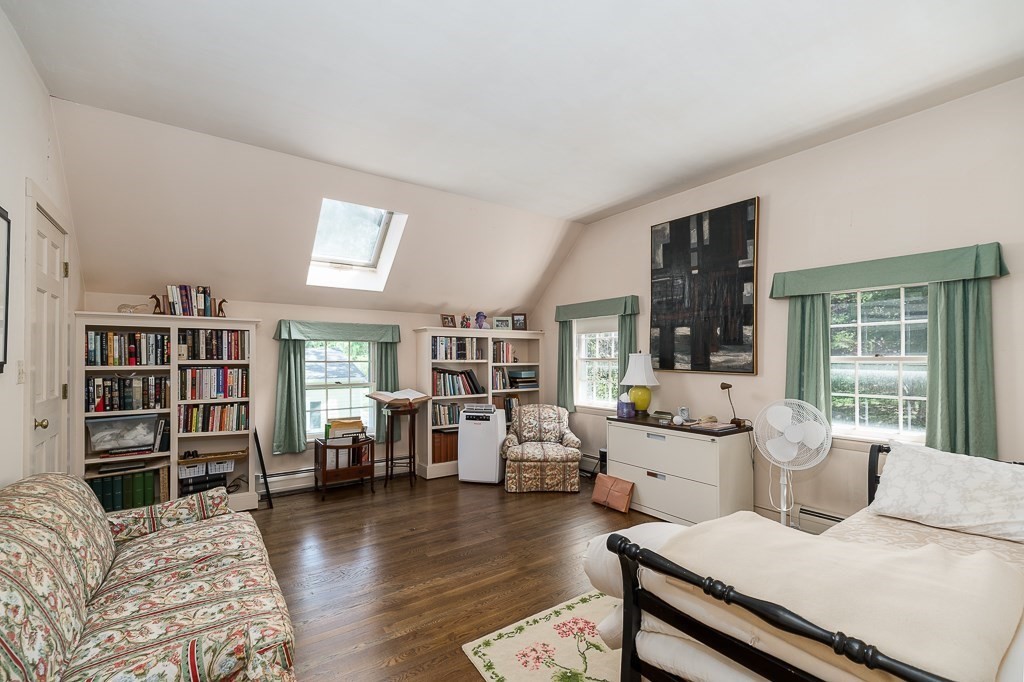 466 Bridge Street Hamilton, MA 01982 - Photo 18 of 40 a living room with furniture and a wooden floor