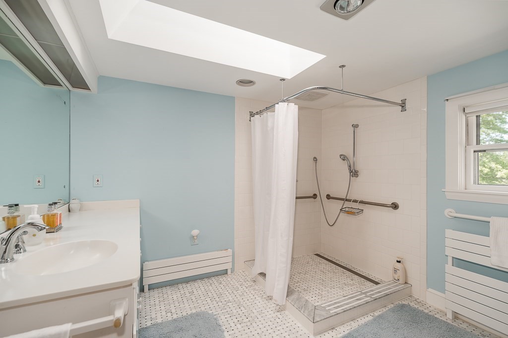 466 Bridge Street Hamilton, MA 01982 - Photo 19 of 40 a bathroom with a sink and shower