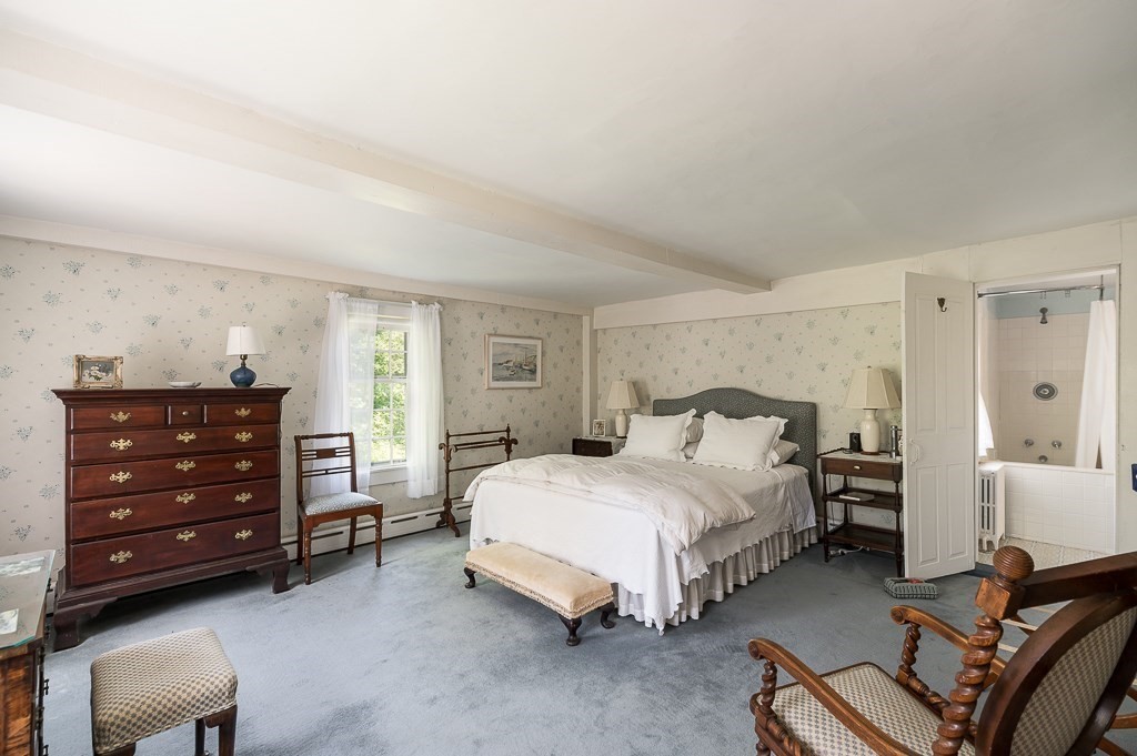 466 Bridge Street Hamilton, MA 01982 - Photo 23 of 40 a bedroom with a bed and furniture