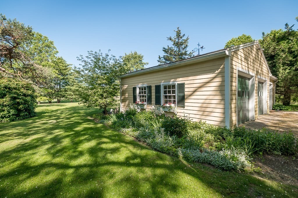 466 Bridge Street Hamilton, MA 01982 - Photo 33 of 40 a view of a house with a yard