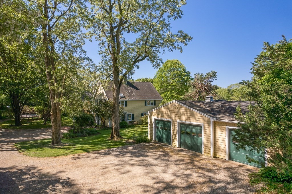 466 Bridge Street Hamilton, MA 01982 - Photo 36 of 40 a front view of house with yard and green space