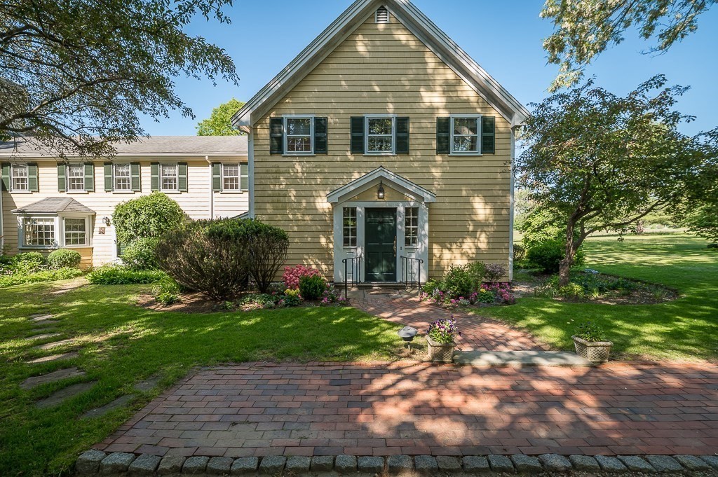 466 Bridge Street Hamilton, MA 01982 - Photo 37 of 40 a front view of a house with a yard