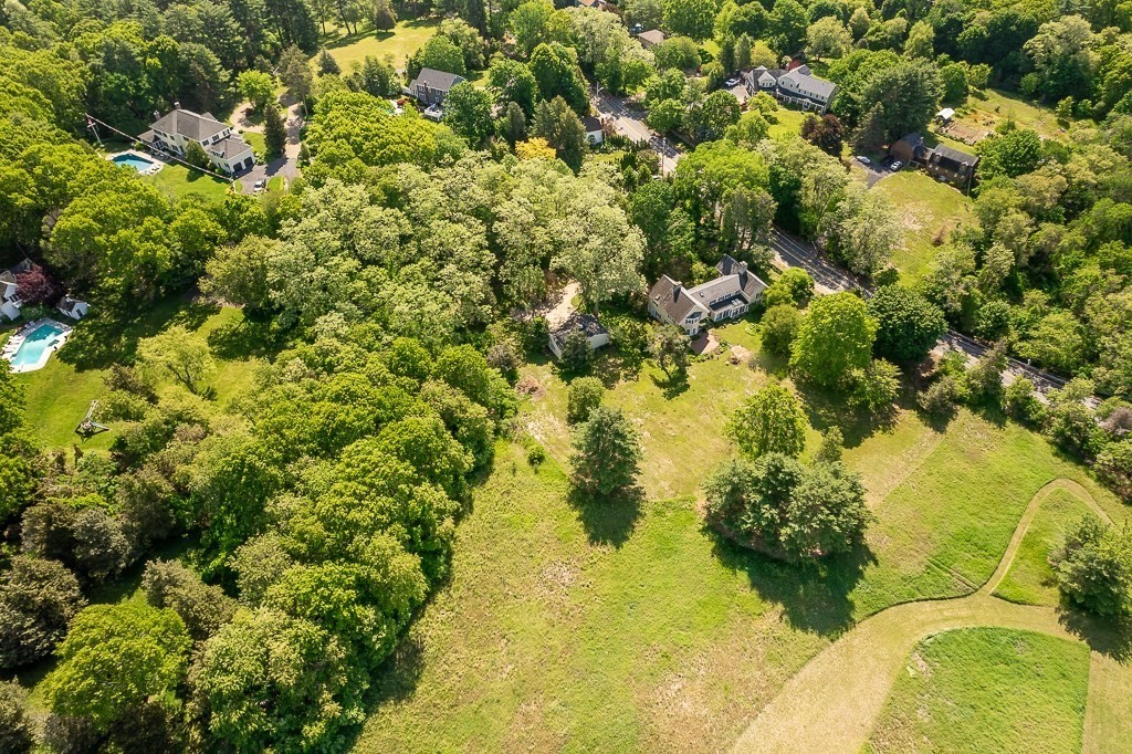 466 Bridge Street Hamilton, MA 01982 - Photo 5 of 40 a view of a lake yard with wooden floor