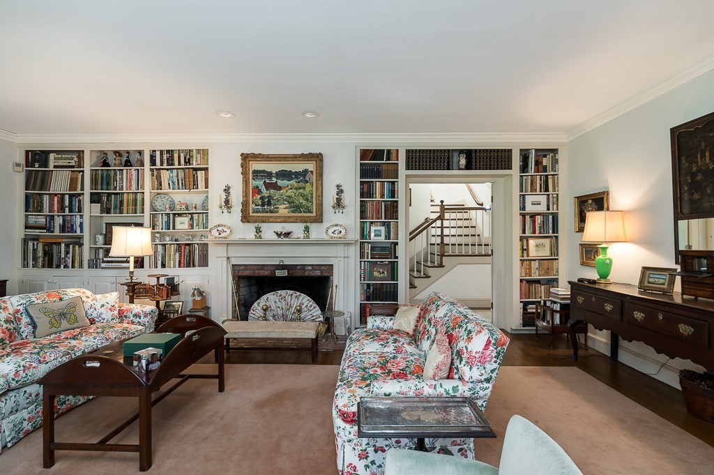 466 Bridge Street Hamilton, MA 01982 - Photo 8 of 40 a living room with furniture and a fireplace