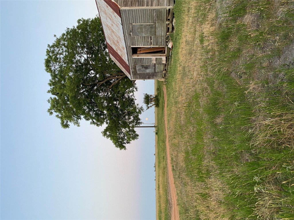 939 Knape Road La Grange, TX 78945 - Photo 1 of 37 View of yard with a rural view and an outbuilding
