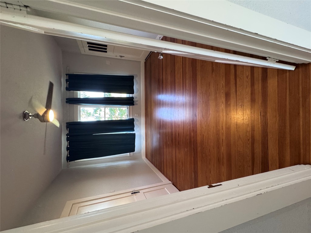 939 Knape Road La Grange, TX 78945 - Photo 24 of 37 Empty room with hardwood / wood-style floors and ceiling fan