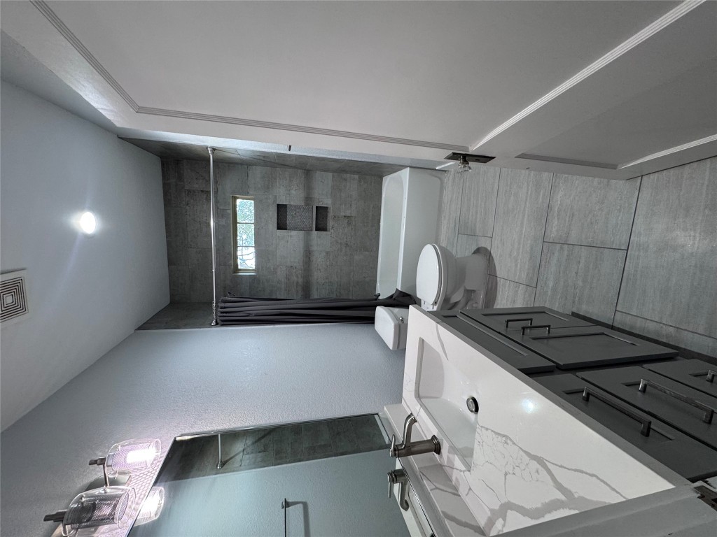 939 Knape Road La Grange, TX 78945 - Photo 31 of 37 Full bath with shower / bath combo, vanity, and a textured wall