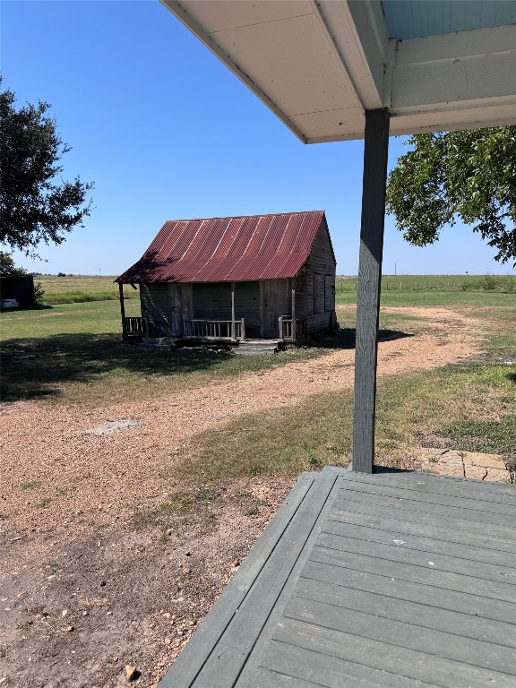 939 Knape Road La Grange, TX 78945 - Photo 5 of 37 View of grassy yard featuring a view of countryside and an outbuilding