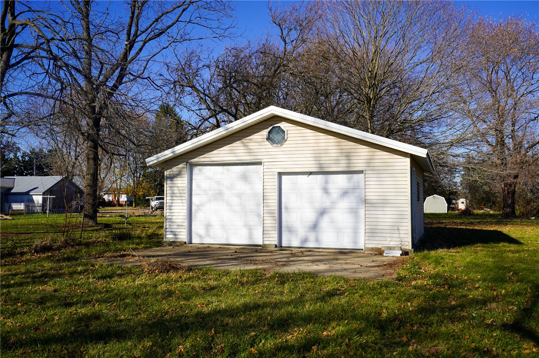 8746 Grubbs-Rex Road Arcanum, OH 45304 - Photo 26 of 38 This spacious detached garage offers ample parking and storage, situated on a large lot.