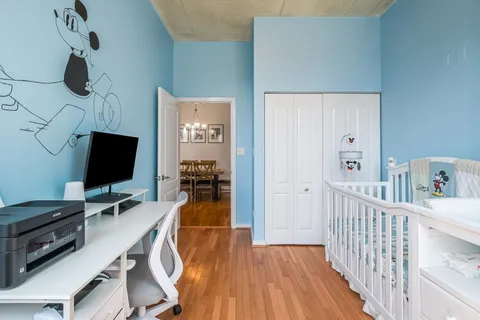 a room with furniture and wooden floor