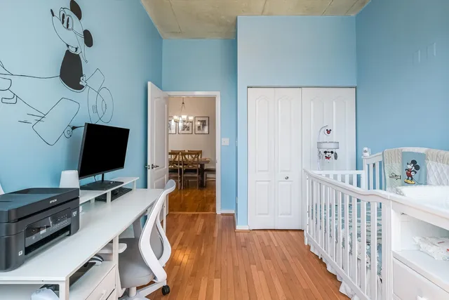 a room with furniture and wooden floor