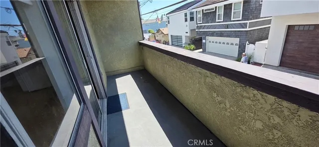 a view of balcony and wooden floor