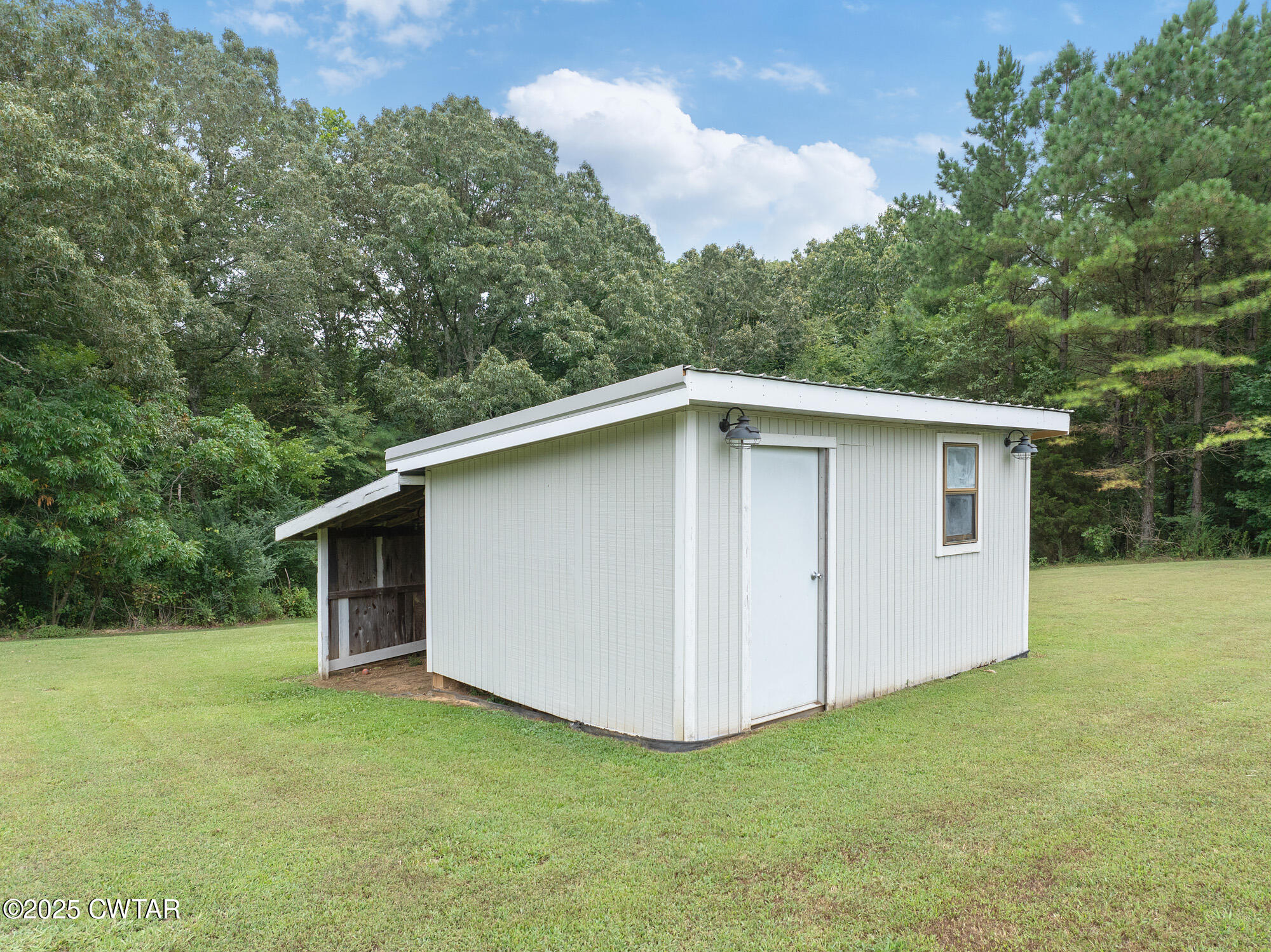 105 Center Hill-Wright Road Reagan, TN 38368 - Photo 11 of 42 a view of a house with backyard